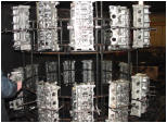 The custom parts rack seen here holds 30 heads for cleaning at one time.